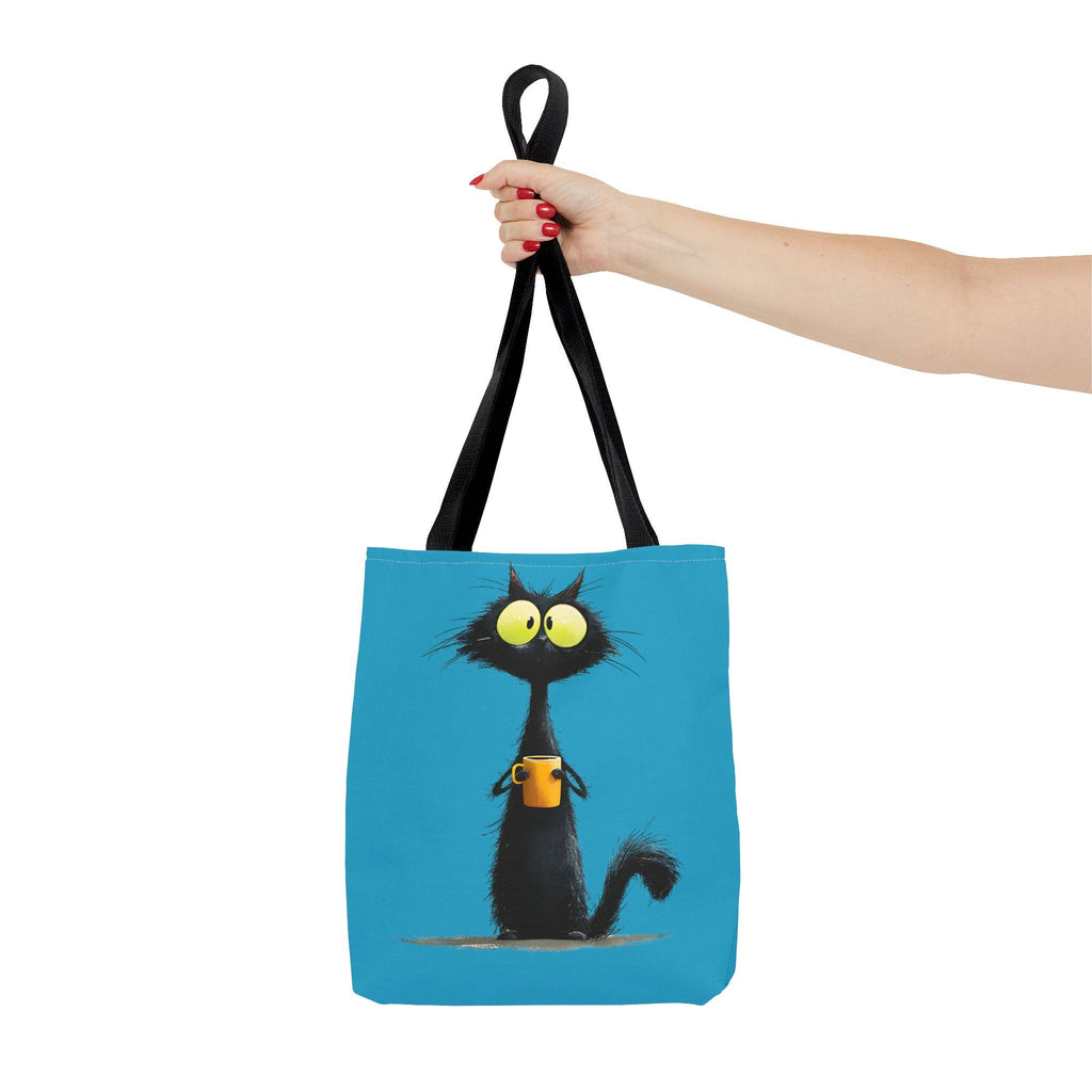 Wide-Eyed Black Cat Holding Coffee Tote Bag | Cute Cartoon Cat Illustration