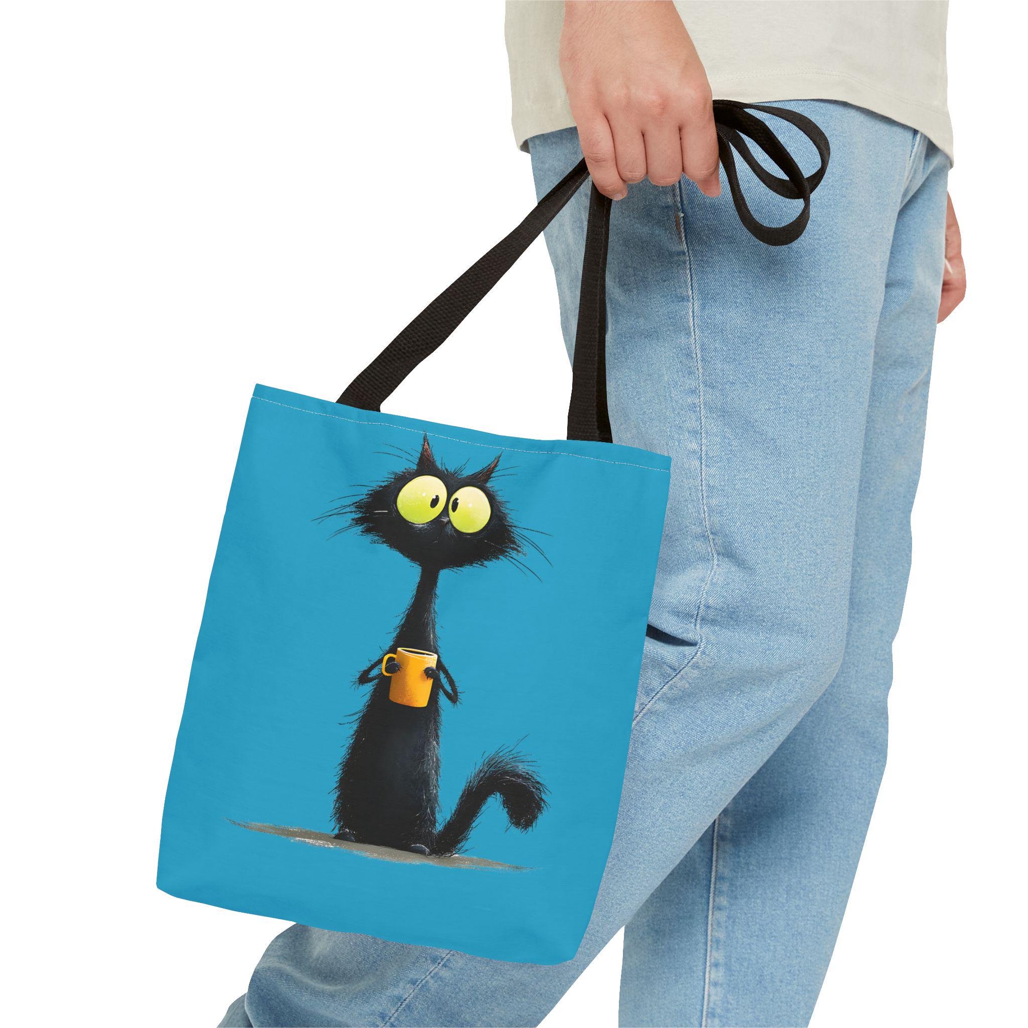Wide-Eyed Black Cat Holding Coffee Tote Bag | Cute Cartoon Cat Illustration